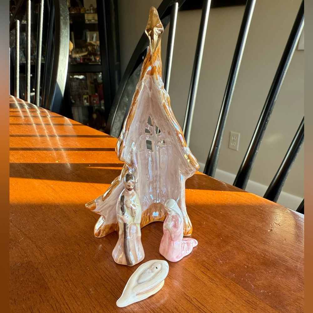 Porcelain like iridescent nativity scen